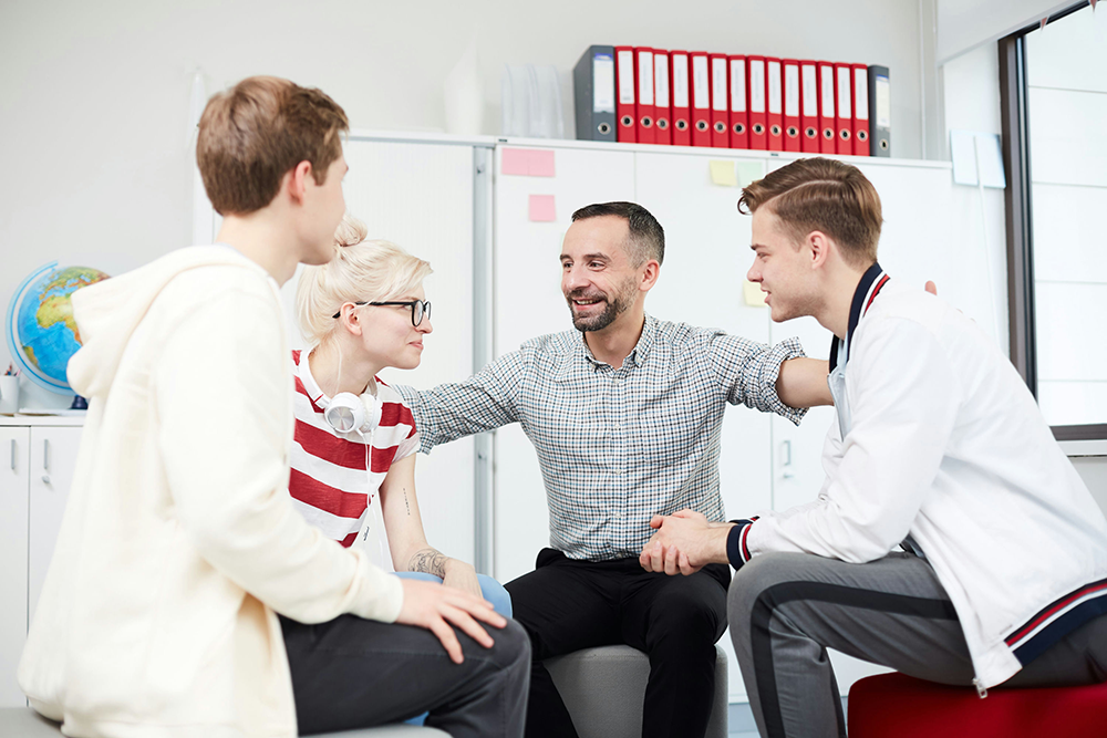 Group therapy session for teens at a dual diagnosis treatment center in Ohio