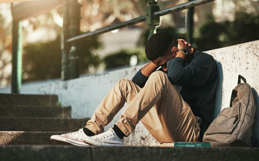 Teen experiencing anxiety and isolation, a common risk factor for substance use.