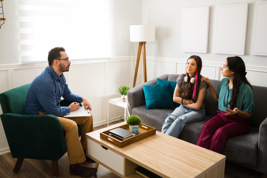 Family therapy session helping a teen manage both depression and addiction