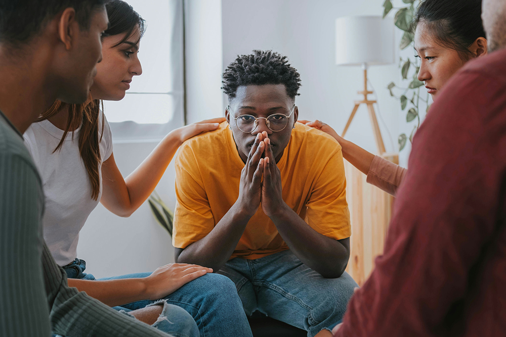 Teens participating in integrated dual diagnosis group therapy for depression and addiction.