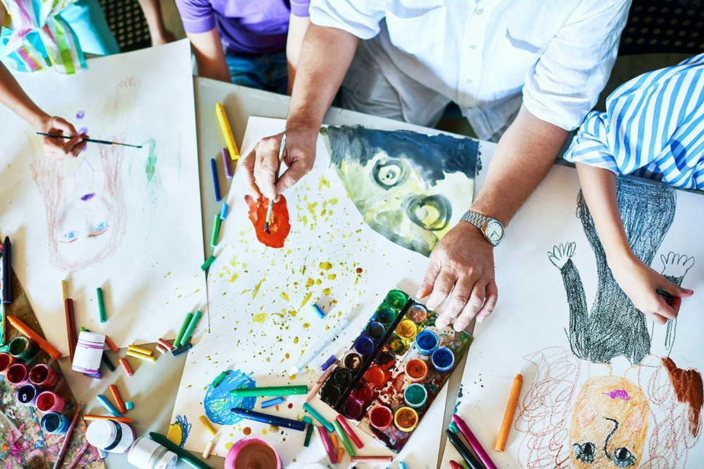 Child psychologist supporting young patients with play-based therapy.