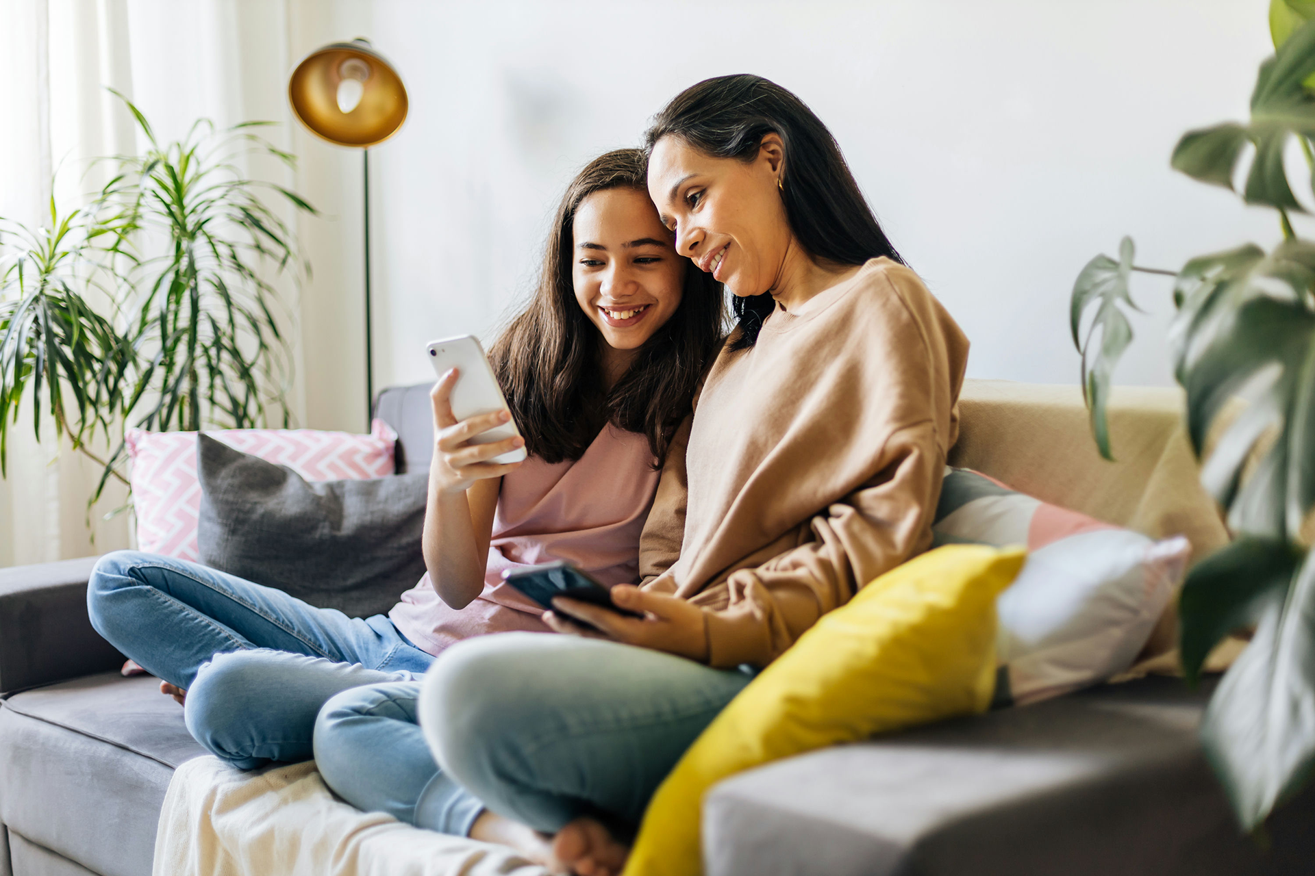 Parent and teen sitting together, showing support during depression and addiction recovery.