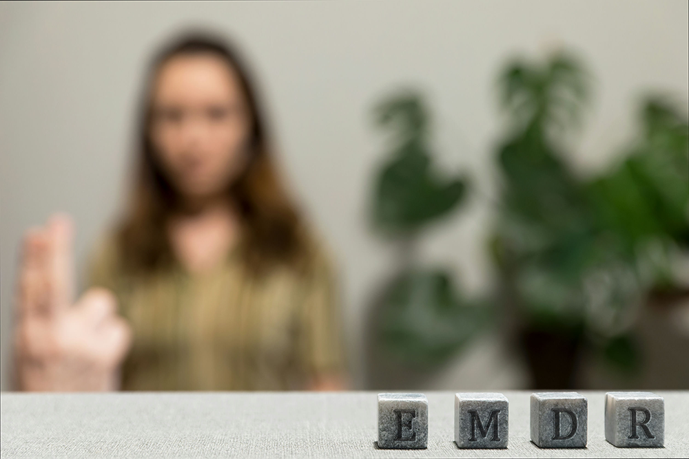 een engaging in eye movement exercise during EMDR therapy to process trauma and stress.