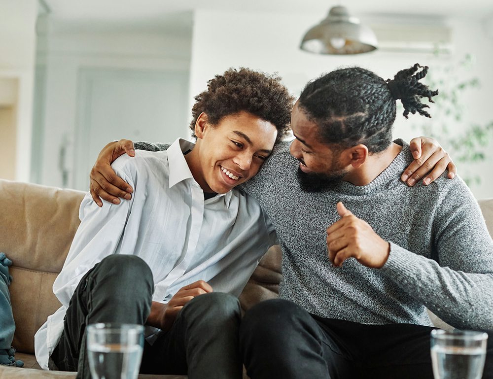 Parent supporting their teen’s EMDR therapy journey with open communication and encouragement at home.