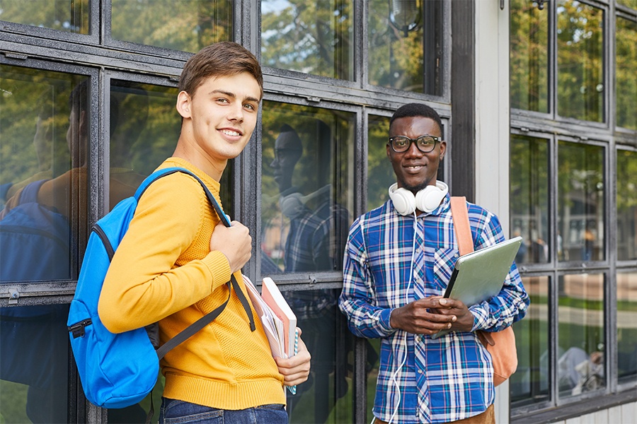 teen boys hanging out outside after school, spending time with friends for self-care