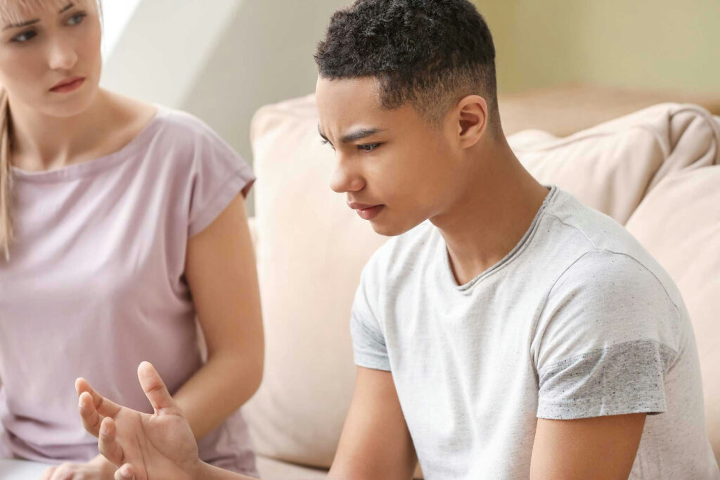 Licensed clinician talking with a teen in a non-clinical setting, highlighting personalized care in an adolescent PHP.