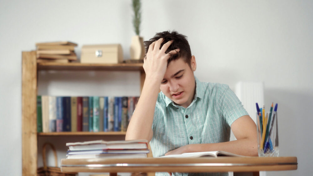 Teen experiencing emotional and concentration challenges associated with bipolar disorder.