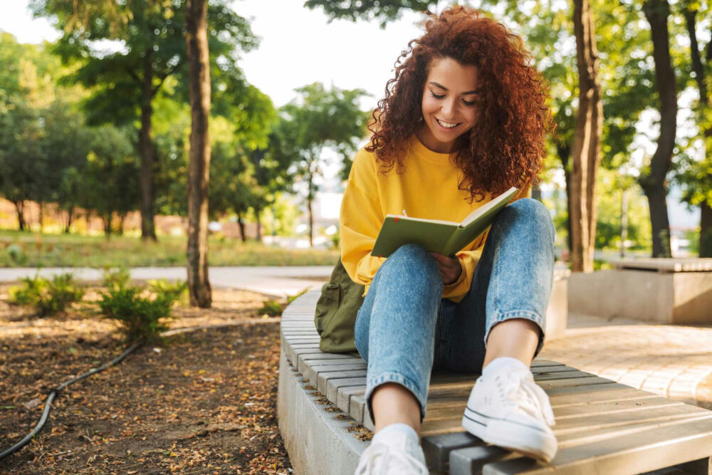 Teen reflecting on emotions and mental health challenges in a quiet setting.
