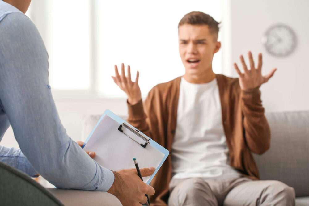 Teen learning emotional regulation skills during behavioral therapy for oppositional defiant disorder