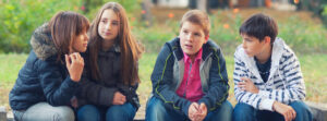 Group of four teens talking about what to do if therapy is not enough.